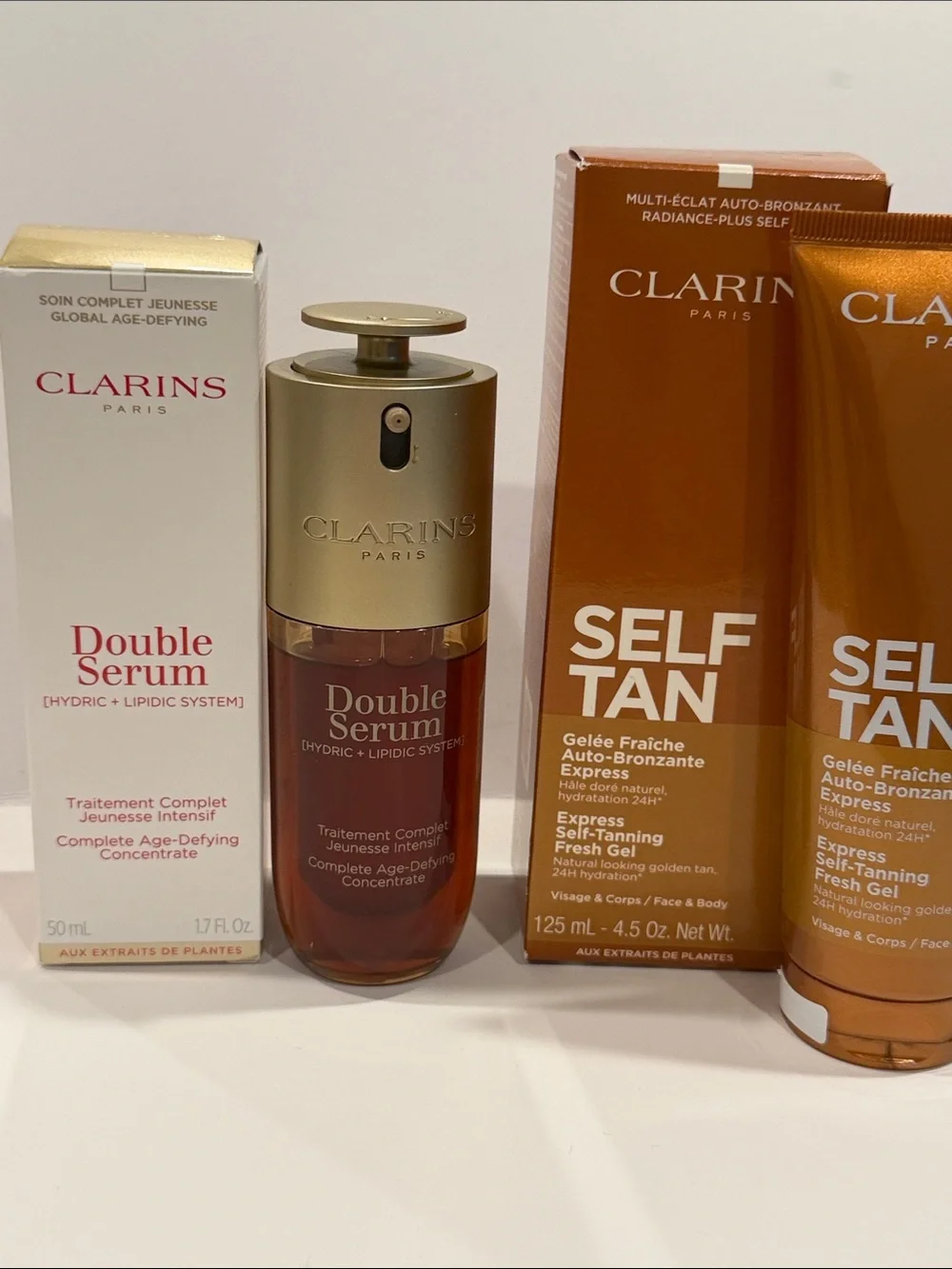 Clarins Double Serum & Self Tan Set — Gold, White, Bronze